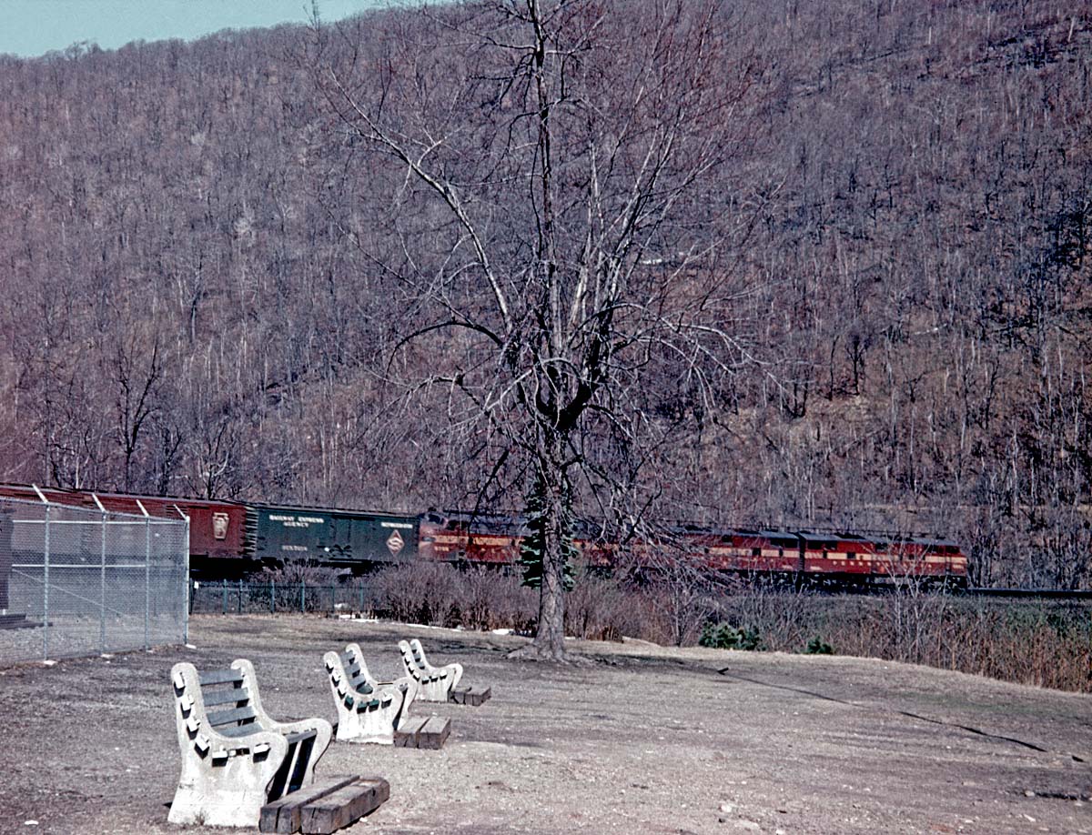My Dad wasn't really a train fan, so to speak, but we're genetically disposed to appreciate transport in its many guises.

He roamed western Pennsylvania as a field director for the Presbyterian Church and on one of his trips in February 1960, he made a stop at the Horseshoe Curve and recorded this express train headed to points east.

Photographer Don Hall, Sr.

Don Hall
Yreka, CA